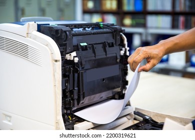 Technician Hand Open Cover Photocopier Or Photocopy To Fix Copier Paper Jam And Replace Ink Cartridges For Scanning Fax Or Copy Document In Office Workplace.