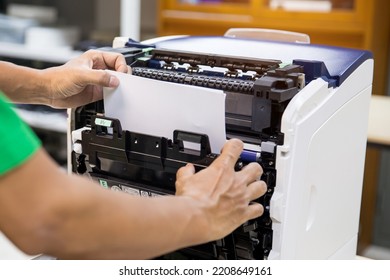 Technician Hand Open Cover Photocopier Or Photocopy To Fix Copier Paper Jam And Replace Ink Cartridges For Scanning Fax Or Copy Document In Office Workplace.