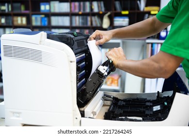 Technician Hand Open Cover Photocopier Or Photocopy To Fix Copier Paper Jam And Replace Ink Cartridges For Scanning Fax Or Copy Document In Office Workplace.