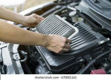 Technician Holding Dirty Air Filter For Car, Maintenance And Repair Concept