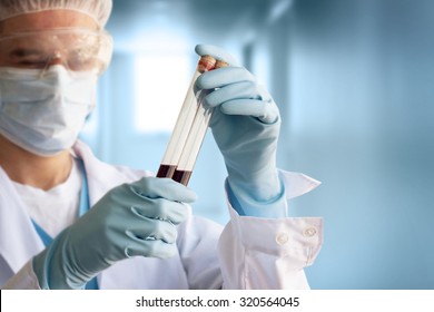 Technician Holds Laboratory Blood Panel Sample Test Tube