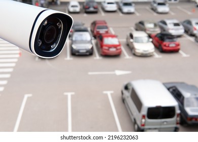 Technician Installed IP CCTV Camera Hi-technology For Look Security Area Of Work In Car Parking Lot Show Signage With Security Cars Park In Area.