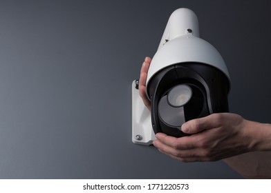 Technician installing CCTV camera video security, copy space.