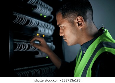 Technician man, server room and inspection for cables, thinking and focus for analysis, night and programming. Information technology engineer, maintenance and database with problem solving mindset