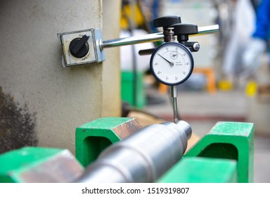 Technician Measuring Shaft Runout By Dial Gauge.