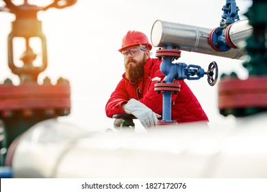 Technician In Oil And Gas Refinery. Worker In Oil Refinery.