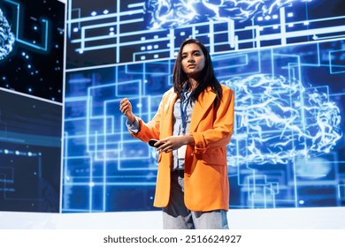 Technician presenting how artificial intelligence technologies can bring businesses increased productivity during IT expo. Expert talks about implementation of AI driven solutions during tech forum