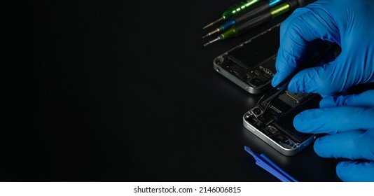 Technician Repairing The Cell Phone Parts And Tools For Recovery Repair Phone Smartphone And Upgrade Mobile Technology,the Concept Of Computer Hardware Inside.