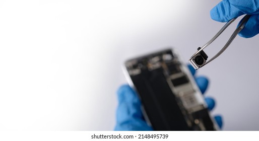 Technician Repairing The Cell Phone Parts And Tools For Recovery Repair Phone Smartphone And Upgrade Mobile Technology,the Concept Of Computer Hardware Inside.