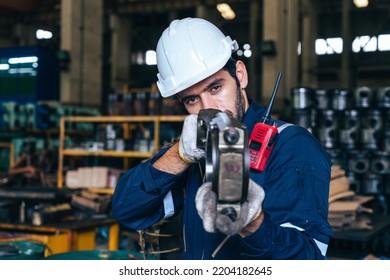 The Technician Repairing And Inspecting The Big Diesel Engine In The Train Garage