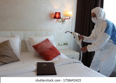 A Technician Is Sanitizing An Hotel Room In Prague, Using Steam And Ozone,  After The Coronavirus SARS-CoV-2 COVID-19 Pandemic