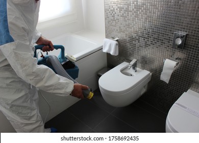 A Technician Is Sanitizing An Hotel Room In Prague, Using Steam And Ozone,  After The Coronavirus SARS-CoV-2 COVID-19 Pandemic