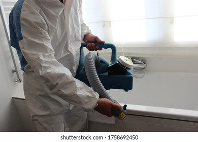 A Technician Is Sanitizing An Hotel Room In Prague, Using Steam And Ozone,  After The Coronavirus SARS-CoV-2 COVID-19 Pandemic