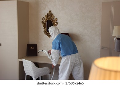 A Technician Is Sanitizing An Hotel Room In Prague, Using Steam And Ozone,  After The Coronavirus SARS-CoV-2 COVID-19 Pandemic