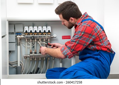Technician servicing the underfloor heating