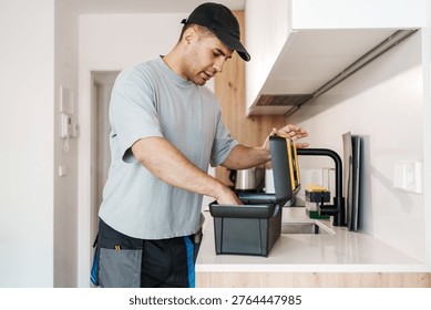 Technician Skillfully Disassembles And Reassembles Coffee Machine Parts For Optimal Performance And Durability