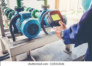 Technician Thermography Servicing An Water Motor Cooling Tower In Factory