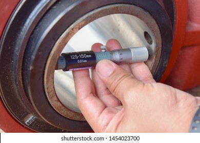 Technician use a Inside Micrometer to measure the diameter inside of the inner ring of bearing.