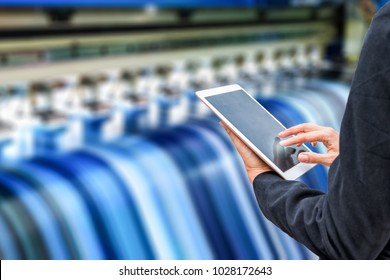 Technician Using Tablet Control With Format Large Inkjet Printing Blue Plate
