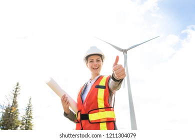 A Technician Woman Engineer In Wind Turbine Power Generator Station