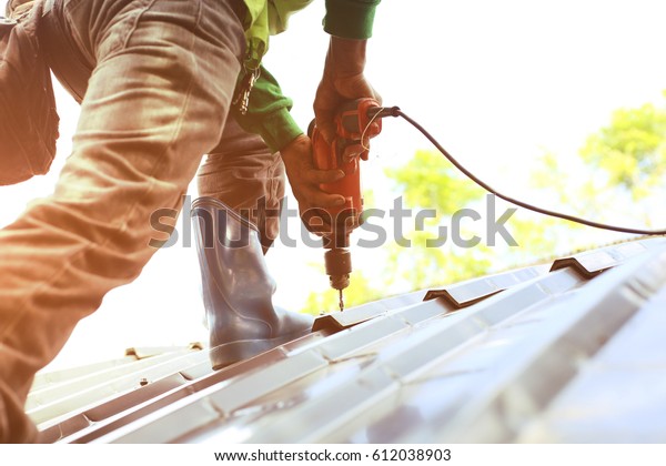 technician-work-roof-repair-stock-photo-edit-now-612038903