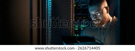 IT Technician Working in Data Server Room