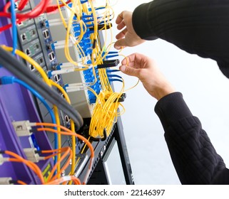 Technician working on server rack