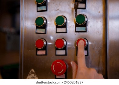 Technician young woman adjust control panel of machine in factory for optimal performance, industrial machine and worker or engineer, woman push button machinery, rear view, industry concept. - Powered by Shutterstock