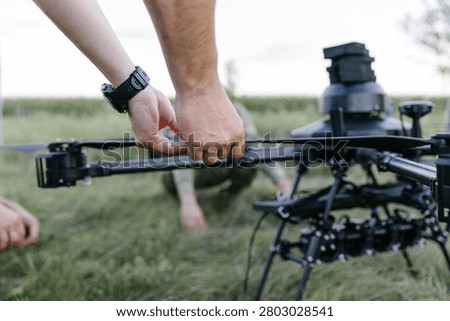 Technicians assembling and preparing a ukrainian heavy strike hexacopter, an uncrewed aerial vehicle, for military operation
