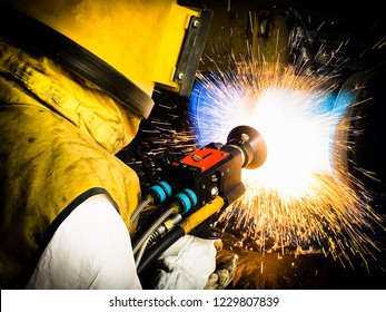 Technicians Repair Shaft By Wire Arc Thermal Spray Process