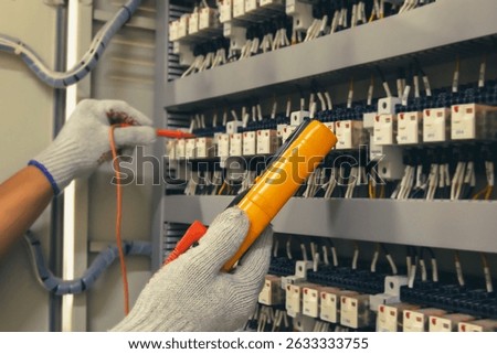 Technicians use multimeter to test or diagnose electrical control devices.
