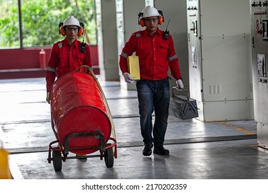 Technicians Using Safety Equipment Is Performing Maintenance On A Diesel Engine At A Power Plant At A Private Power Plant In Bangka Belitung.  April 15th 2015