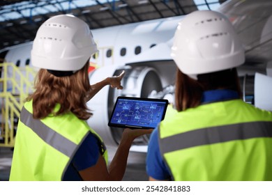 Technicians Using Scada System Aircraft Maintenance Hangar