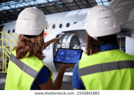 Technicians Using Scada System Aircraft Maintenance Hangar