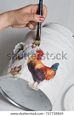technique decoupage. decorating objects with paper napkins with a pattern. A ready-made drawing is used and an appliqué is made. hobbies and interests.