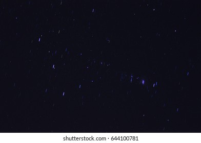 a technique of overlapping image of star movement and still abstract background
