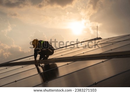Techniques checking solar cell on the roof for maintenance. Service engineer worker install solar panel. Clean energy concept.	