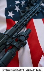 Technological Assault Rifle With Sight Lying On The USA Flag