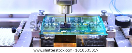 Technological process of soldering and assembly chip components on pcb board. Automated soldering machine inside at industrial, banner side