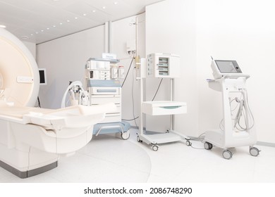 Technologically advanced equipment in CT or MRI Scan room. Modern hospital laboratory. Interior of radiography department. Magnetic resonance diagnostics machine.