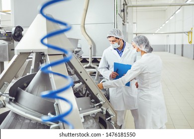 Technologists Inspector In Masks At Food Factory.