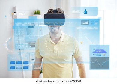 technology, augmented reality, big data and people concept - happy young man with virtual headset or 3d glasses looking at screens projection