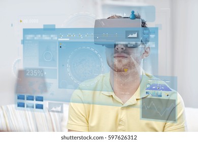 technology, augmented reality, big data and people concept - young man with virtual headset or 3d glasses looking at screens projection
