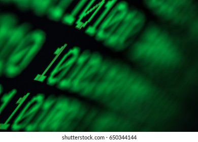 Technology background, close up on texture digital pixel is running prinary code number with black background and selective focus.
