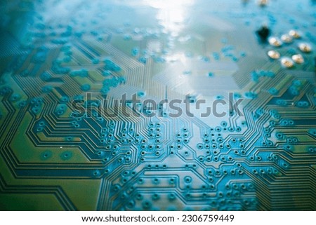 Technology background. High tech electronic circuit board background. Close-up macro electronic circuit board, technology chips to the motherboard. Electronic technology digital chip. Tech background.