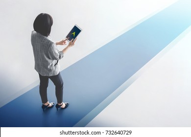 Technology In Business Concept, Full Length Of Working Woman Stand And Using Digital Tablet To Keep Moving Forward, Top View