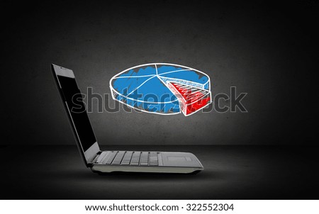 technology, business and statistics concept - open laptop computer with pie chart doodle over dark gray background