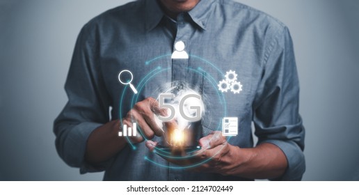 Technology concept and 5g communication. Business people use mobile phones to communicate using 5G technology for high speed data transmission of the future.