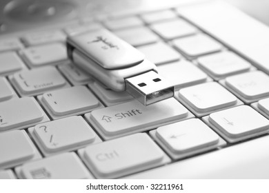 Technology Concept - Usb Flash Drive Over Laptop