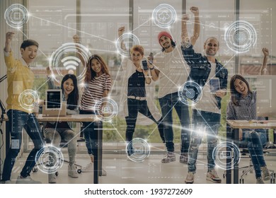 Technology digital virtual screen and Wireless communication connecting over Portrait Group Of Asian and Multiethnic Business people in happy action and celebrate with technology device themself